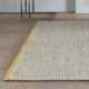 Tapis design en laine de la gamme Marvel beige et jaune