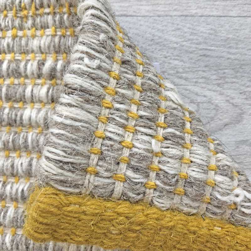 Tapis design en laine de la gamme Marvel beige et jaune