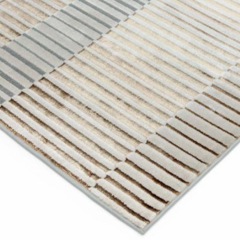 Tapis haut de gamme beige et gris aux motifs rectilignes par Joseph Lebon
