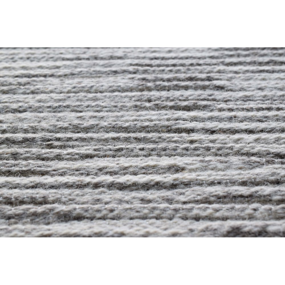 Tapis en laine beige aux effets tricotés par RAGOLLE
