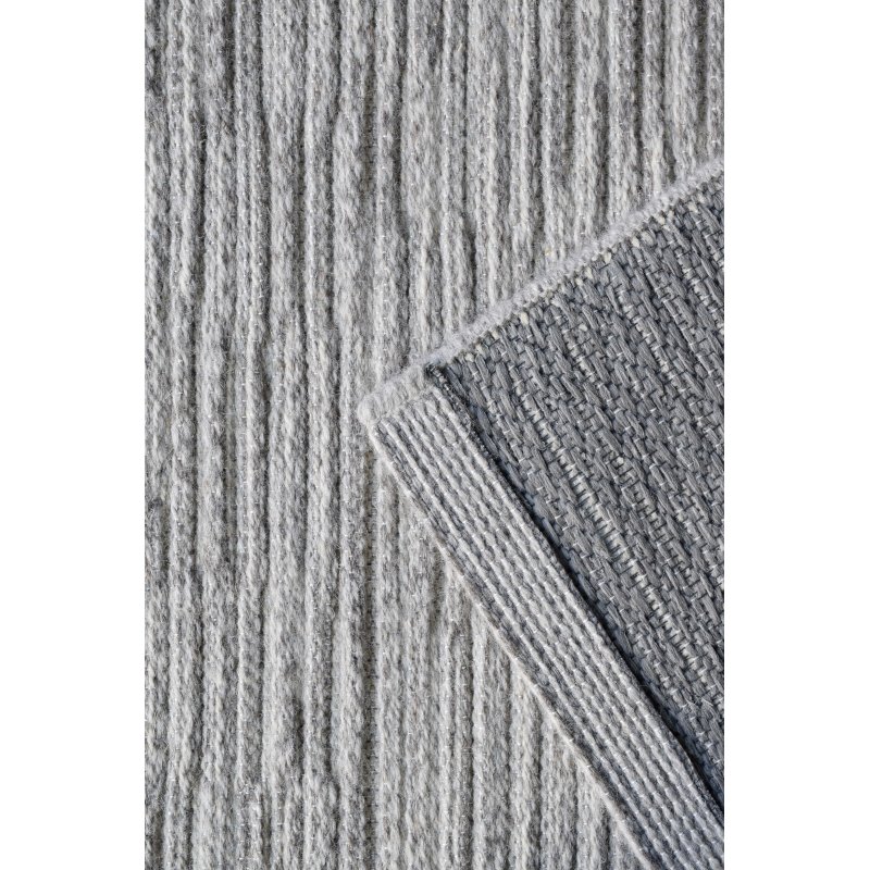 Tapis en laine beige aux effets tricotés par RAGOLLE