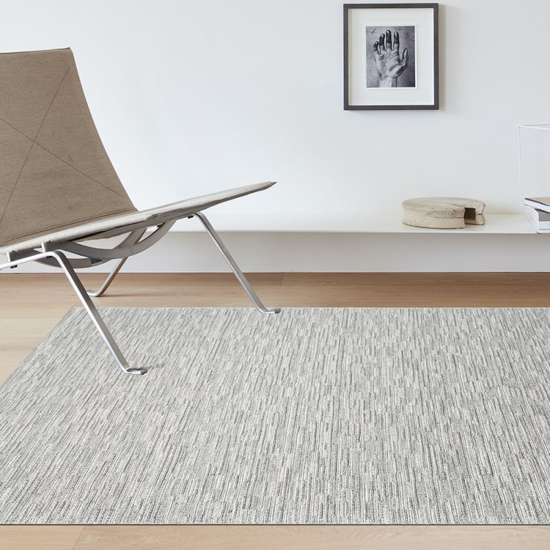 Tapis en laine beige aux effets tricotés par RAGOLLE