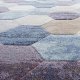 Tapis design aux motifs hexagonaux multicolore