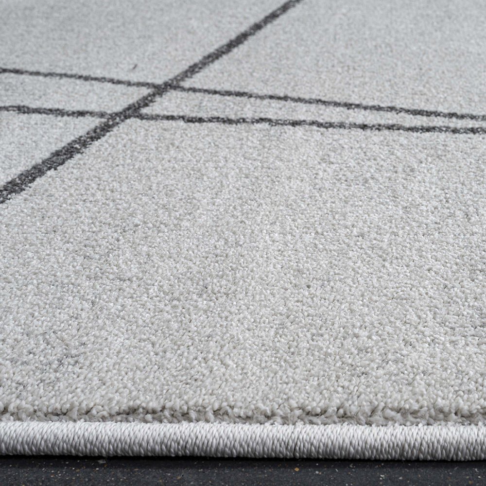 Tapis design ivoire au design épuré