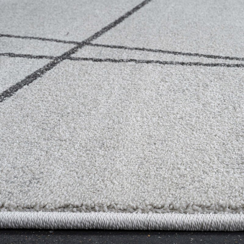 Tapis design ivoire au design épuré