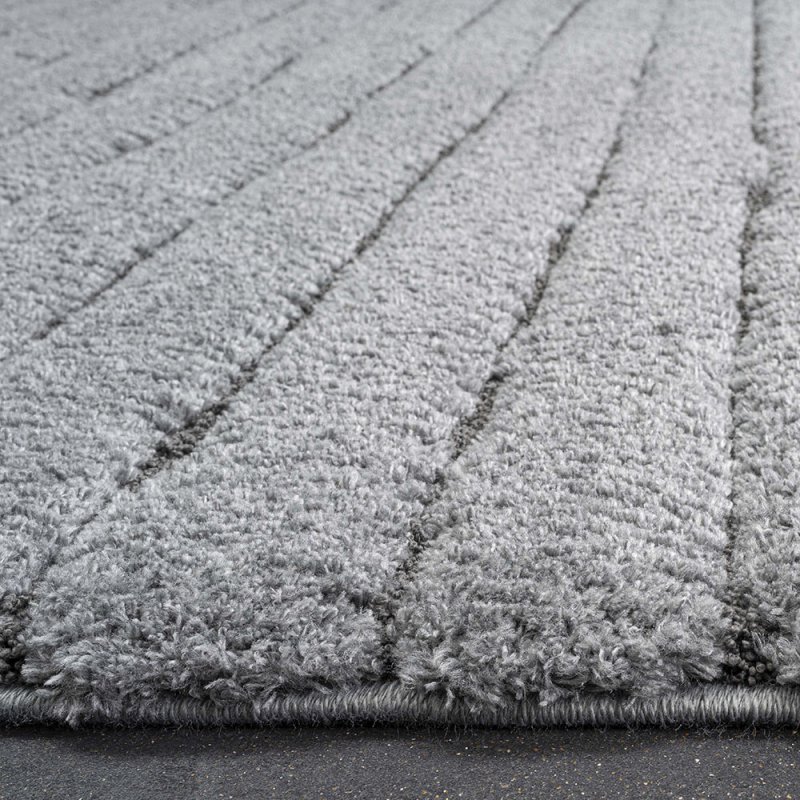 Tapis moderne gris à rayures texturées