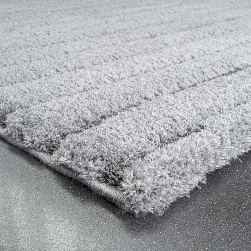 Tapis moderne gris à rayures texturées