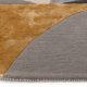 Tapis de salon ovale gris et doré  par Joseph Lebon