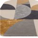 Tapis de salon ovale gris et doré  par Joseph Lebon
