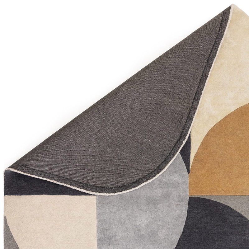 Tapis de salon ovale gris et doré  par Joseph Lebon