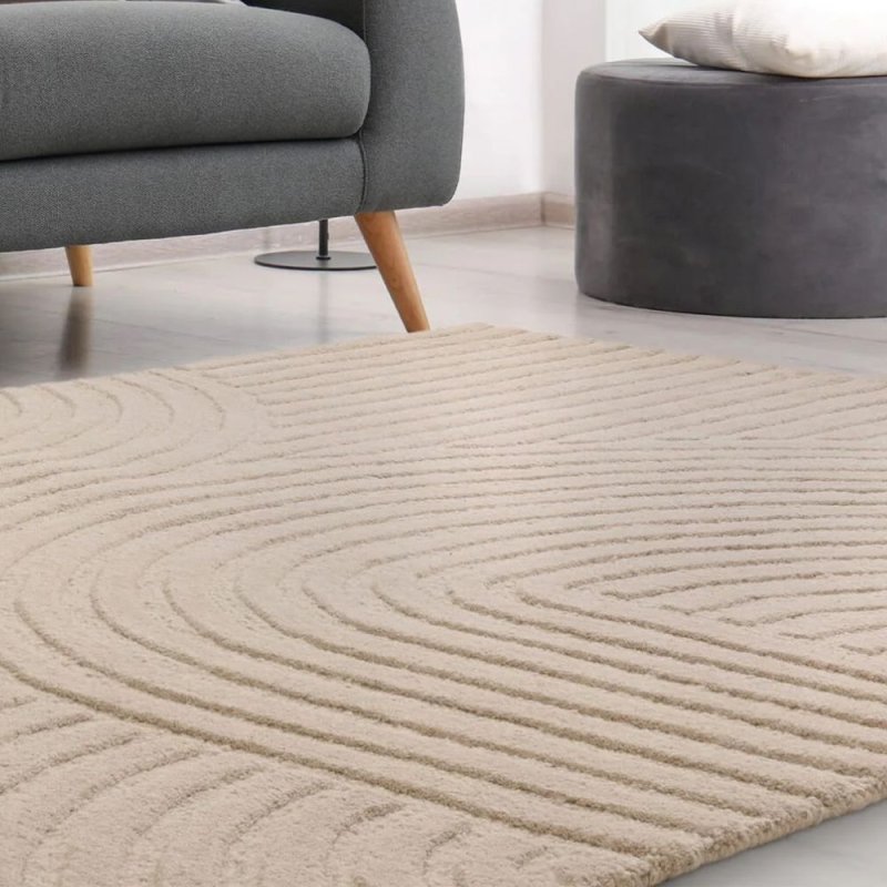 Tapis moderne en laine beige sable par Joseph Lebon