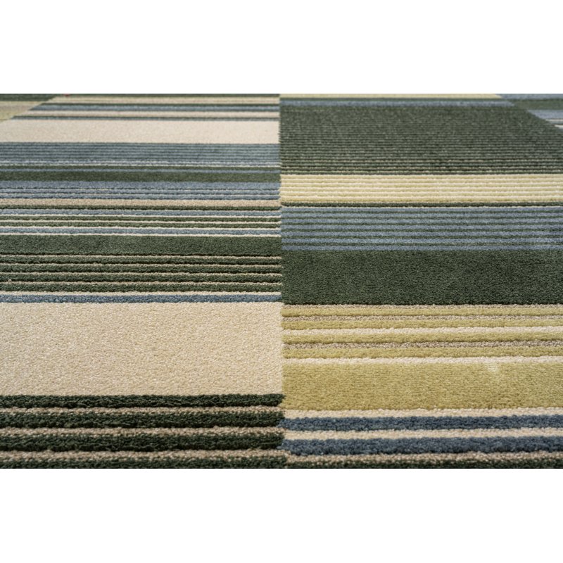 Tapis doux et texturé dans les dégradés de beige