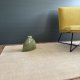 Tapis de de luxe design ivoire sur mesure aspect viscose finition surjet
