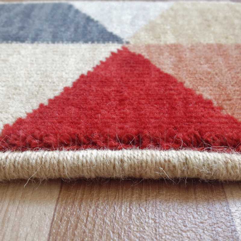 Tapis haut de gamme en laine multicolore a motifs cubiques effet 3D rappelant Vasarely par Ligne Pure