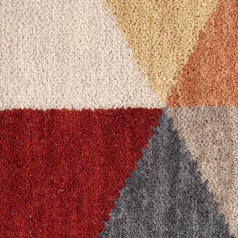 Tapis haut de gamme en laine multicolore a motifs cubiques effet 3D rappelant Vasarely par Ligne Pure