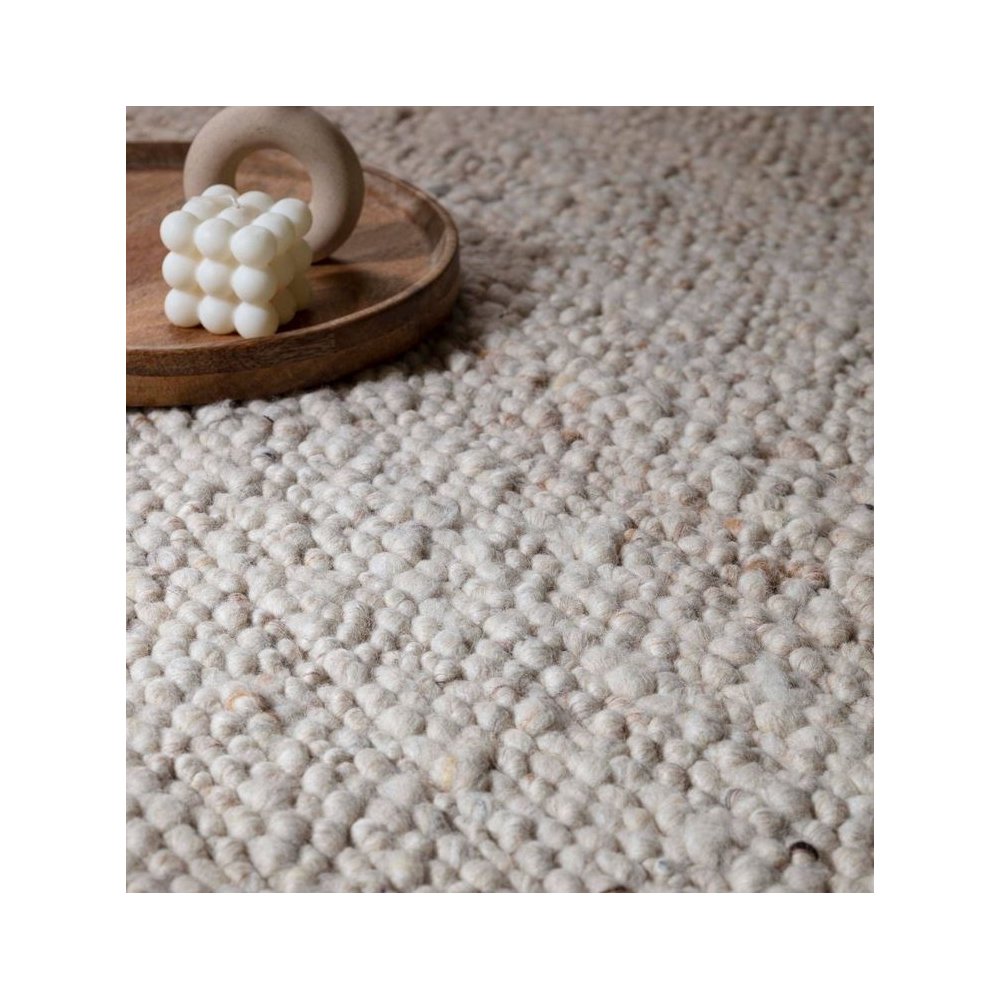 Tapis tendance ivoire en laine bouclée par Joseph Lebon
