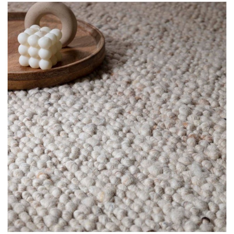 Tapis tendance ivoire en laine bouclée par Joseph Lebon