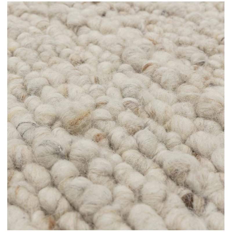 Tapis tendance ivoire en laine bouclée par Joseph Lebon
