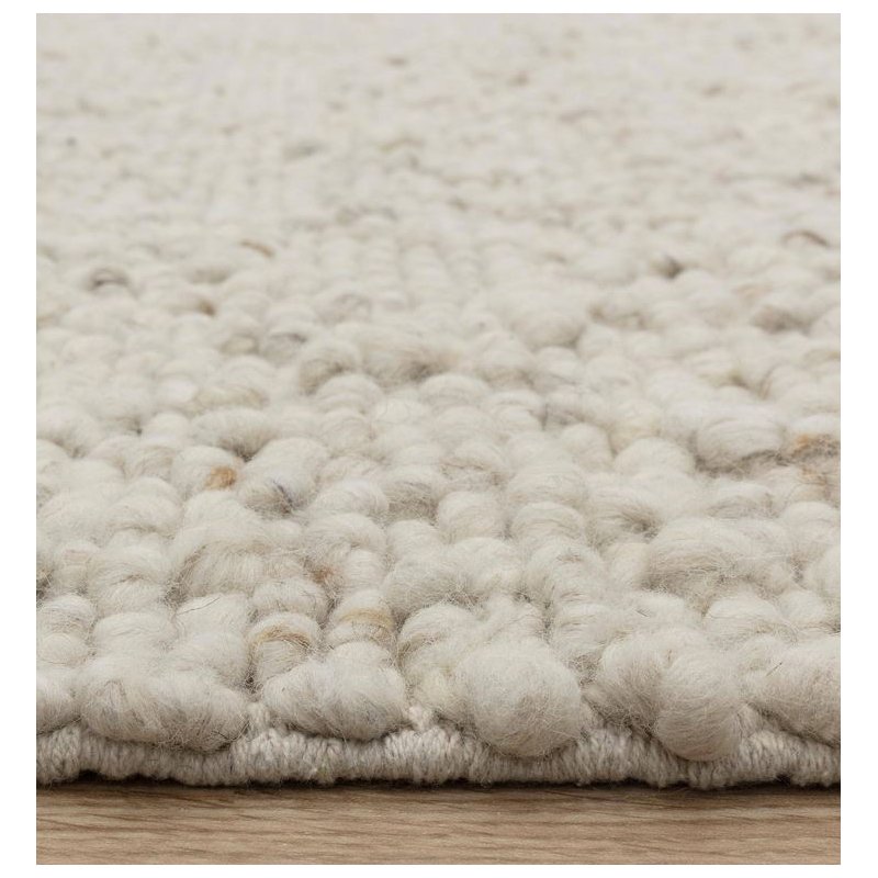 Tapis tendance ivoire en laine bouclée par Joseph Lebon