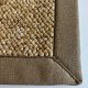 Tapis de salon sur mesure beige clair effet laine bouclée finition gansée