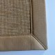 Tapis sur mesure aspect sisal beige clair finition gansée