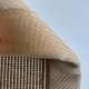 Tapis sur mesure aspect sisal beige clair finition gansée