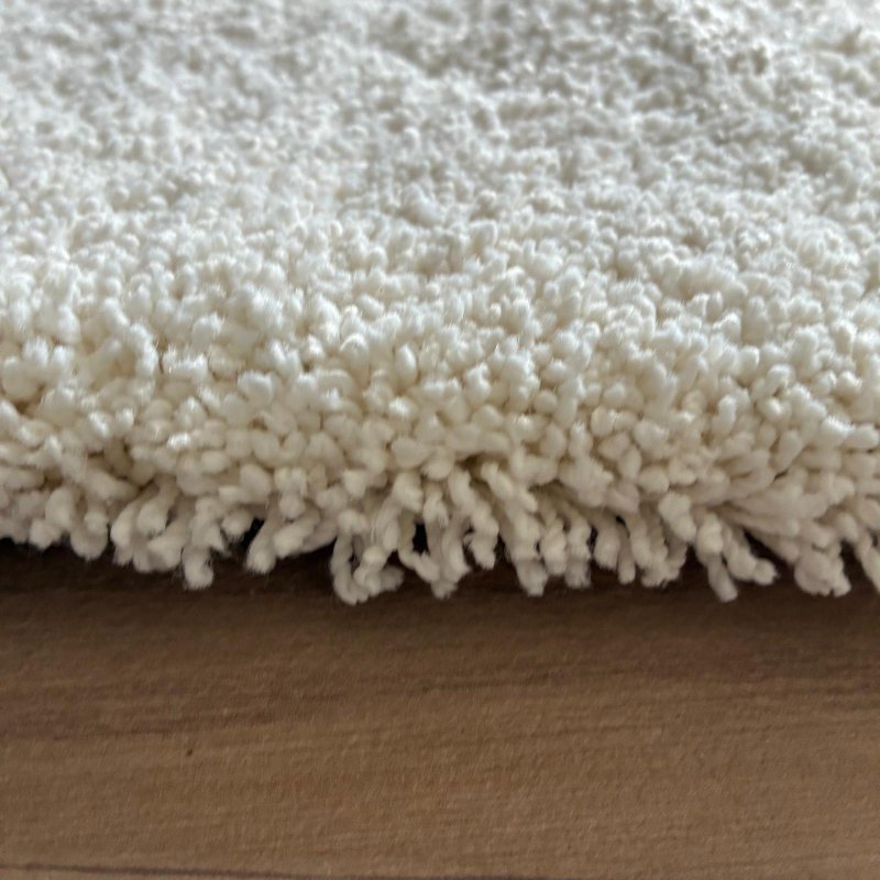 Tapis sur mesure ivoire épais et moelleux