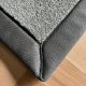 Tapis sur mesure gris clair doux et résistant finition gansée