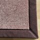 Tapis sur mesure rose doux et résistant finition gansée
