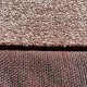 Tapis sur mesure rose doux et résistant finition gansée
