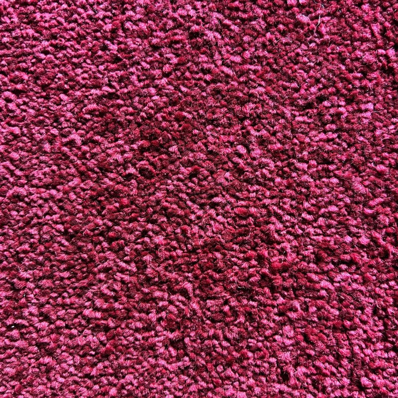 Tapis sur mesure rose doux et résistant finition gansée