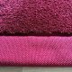 Tapis sur mesure rose doux et résistant finition gansée