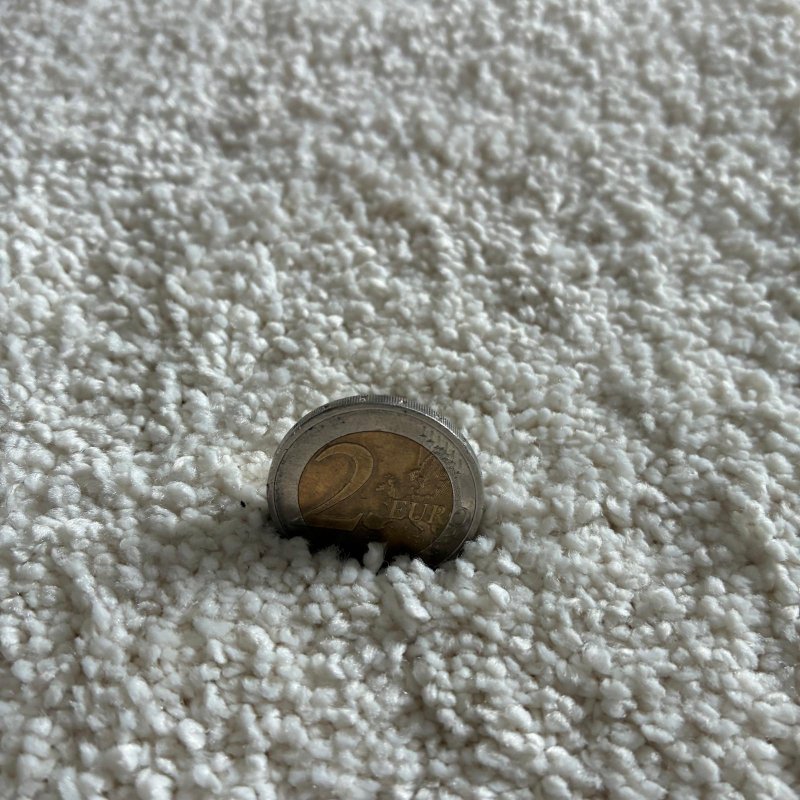 Tapis sur mesure ivoire épais et moelleux finition gansée