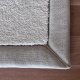 Tapis sur mesure ivoire doux et résistant finition gansée
