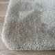 Tapis de de luxe design beige sur mesure aspect viscose finition repli