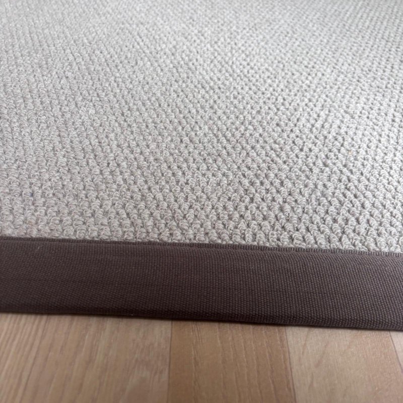 Tapis en laine camel 140 x 200 cm finition gansée