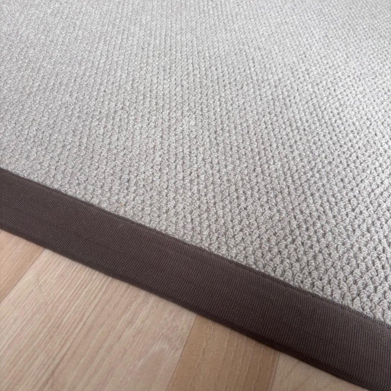 Tapis en laine camel 140 x 200 cm finition gansée