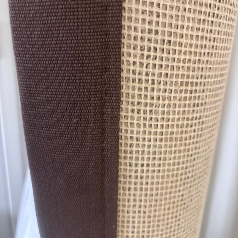 Tapis en laine camel 140 x 200 cm finition gansée