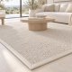 Tapis de salon sur mesure beige clair effet laine bouclée finition gansée