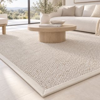 Tapis de salon sur mesure beige clair effet laine bouclée finition gansée