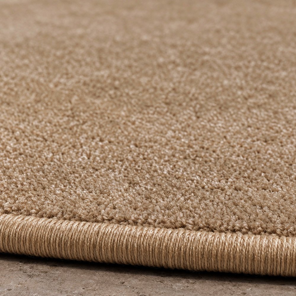 Tapis sur mesure rond en pure laine vierge beige