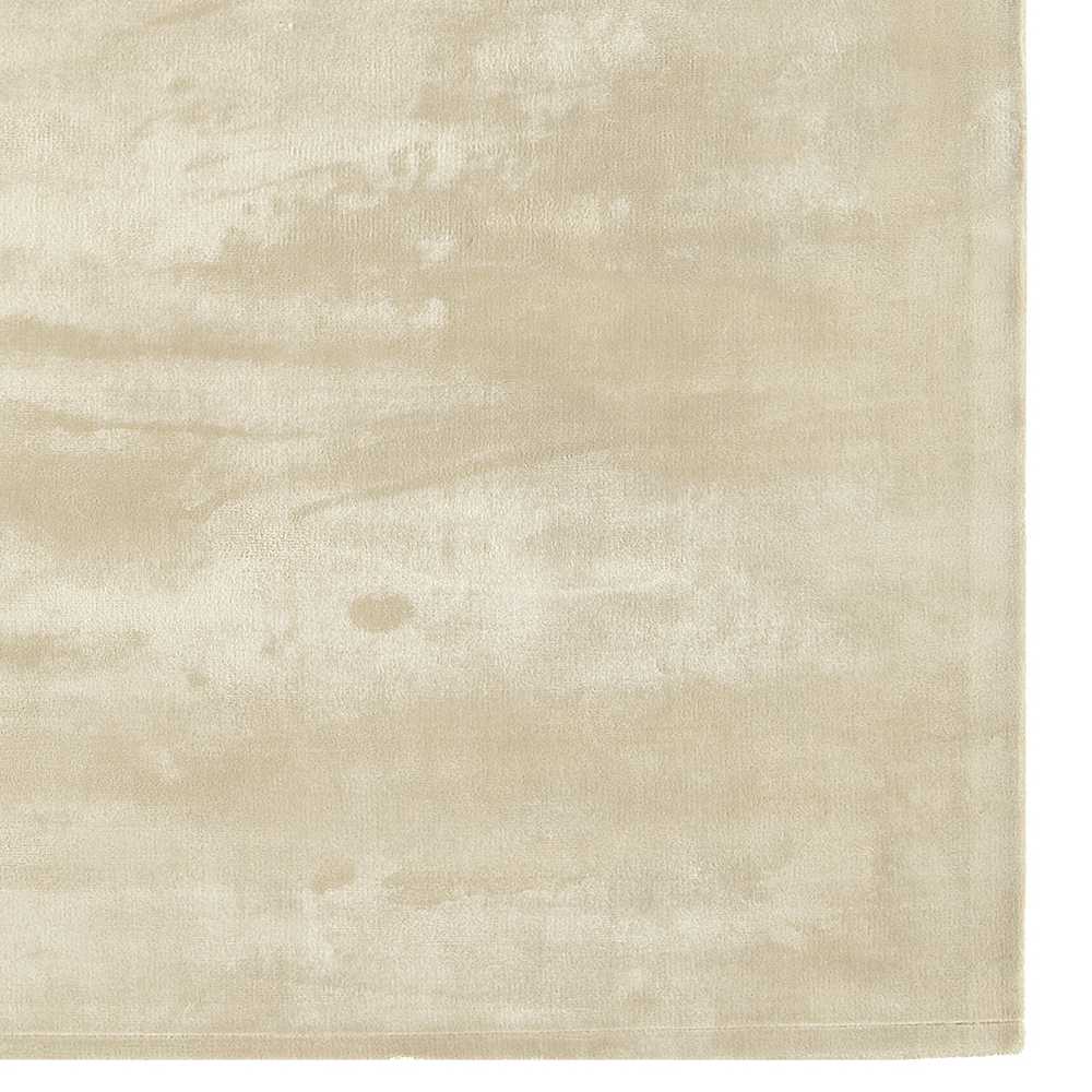 Tapis de luxe uni beige en viscose