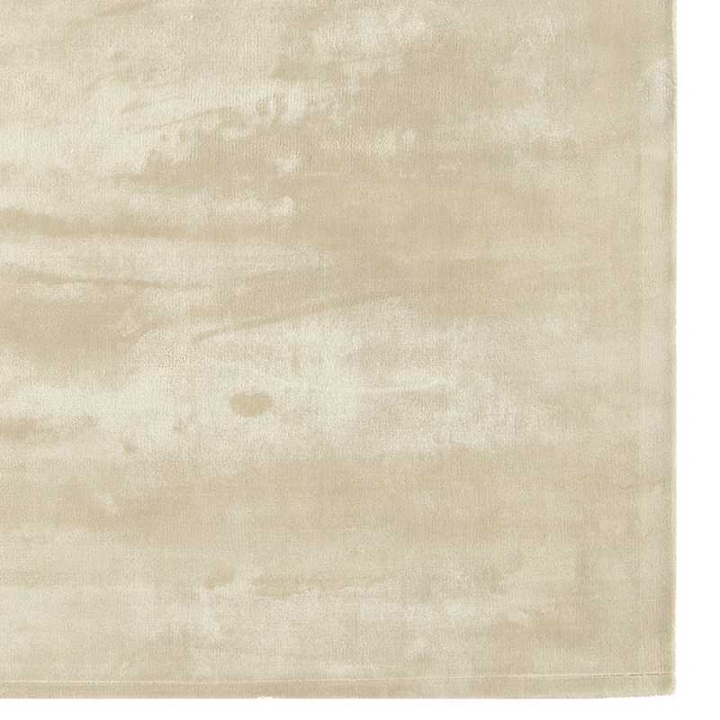Tapis de luxe uni beige en viscose