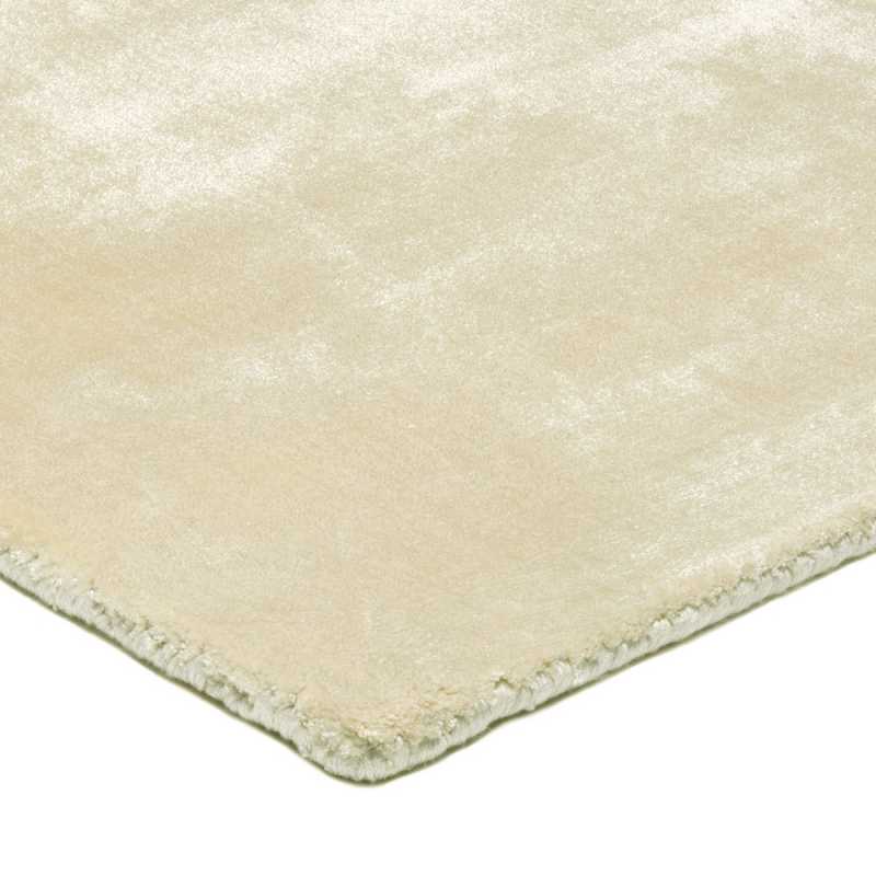 Tapis de luxe uni beige en viscose